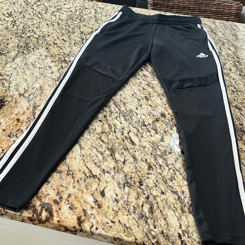 Size extra small black with white stripe Adidas pants.
